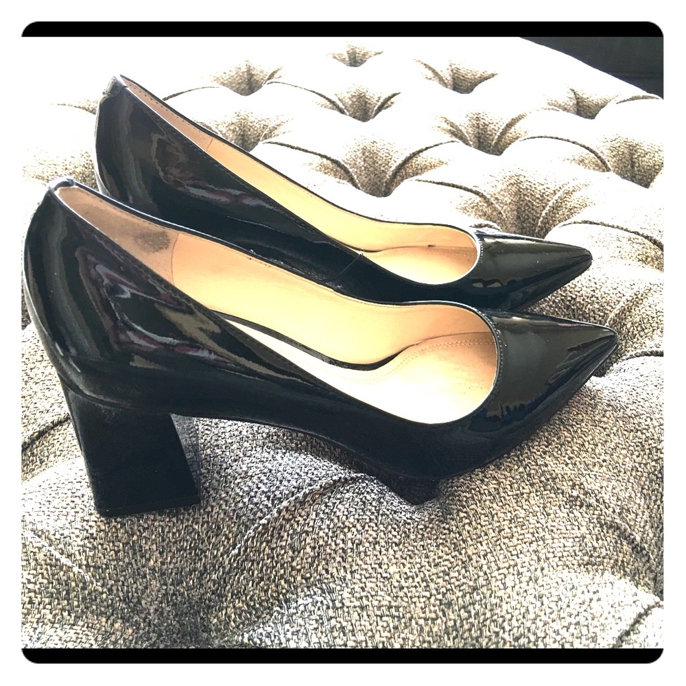 Black patent leather pumps